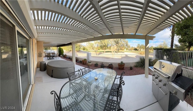 view of patio / terrace with a pergola, grilling area, and exterior kitchen