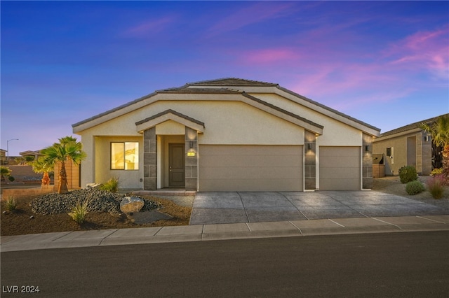 ranch-style house with a garage