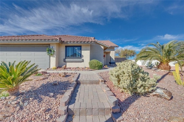 view of front of home with a garage