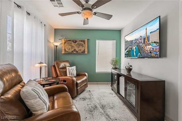 interior space featuring ceiling fan and light tile patterned flooring