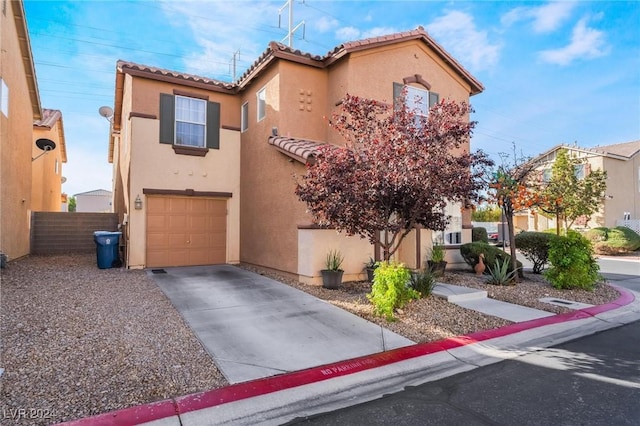 view of front of property with a garage