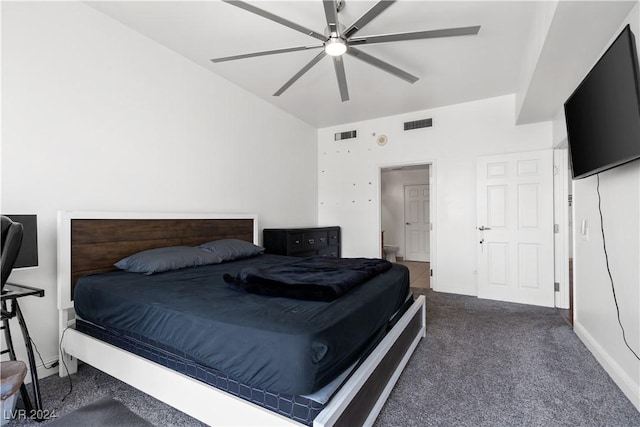 bedroom with dark carpet and ceiling fan