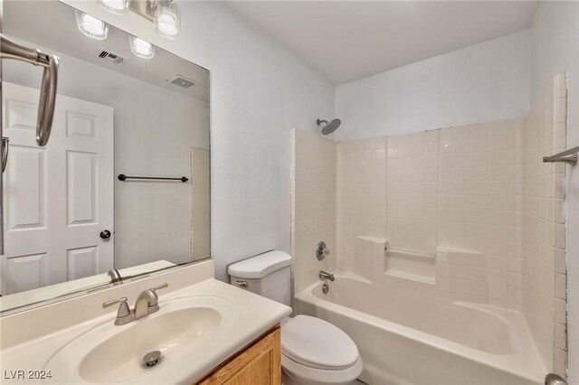 full bathroom with visible vents, shower / washtub combination, toilet, and vanity