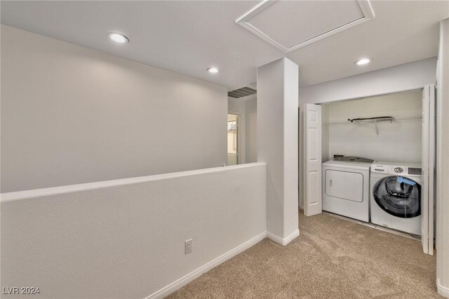 washroom with visible vents, light carpet, laundry area, recessed lighting, and washer and dryer