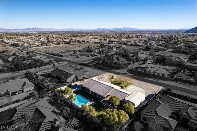 drone / aerial view featuring a mountain view