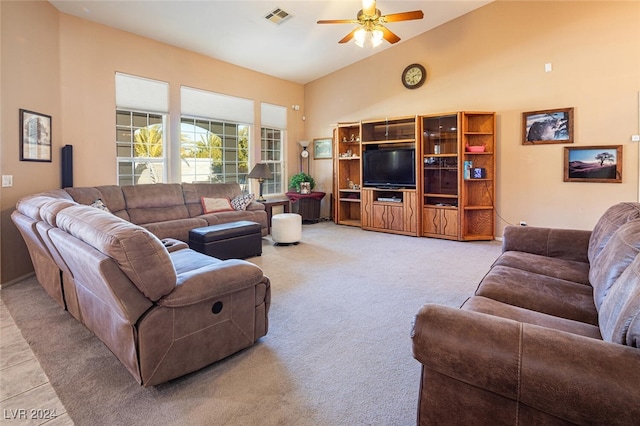 carpeted living room featuring ceiling fan