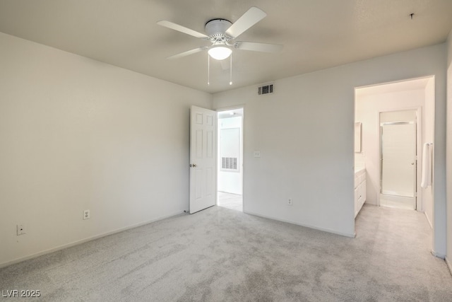 unfurnished bedroom featuring light carpet, visible vents, and a ceiling fan