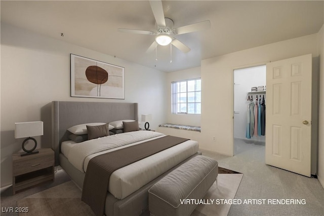 carpeted bedroom featuring ceiling fan, a spacious closet, and a closet