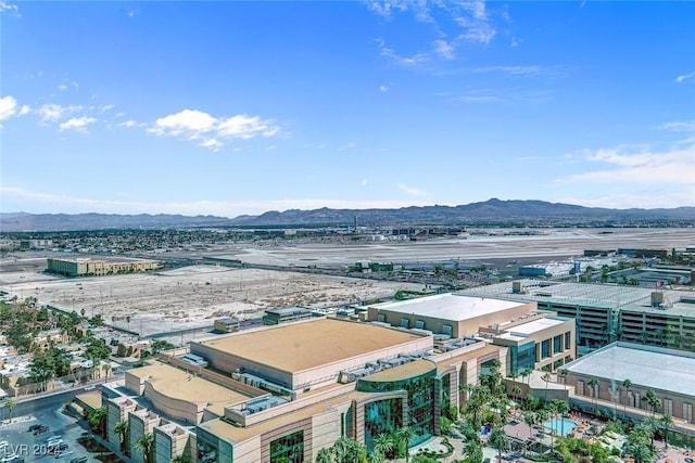 birds eye view of property featuring a mountain view