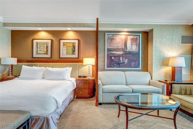 bedroom featuring crown molding