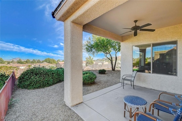 view of patio / terrace featuring ceiling fan