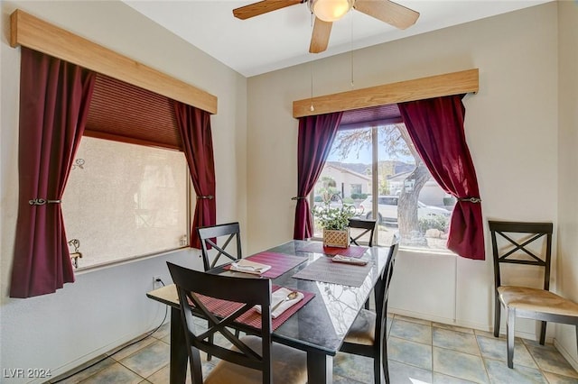 dining room featuring ceiling fan and light tile patterned floors