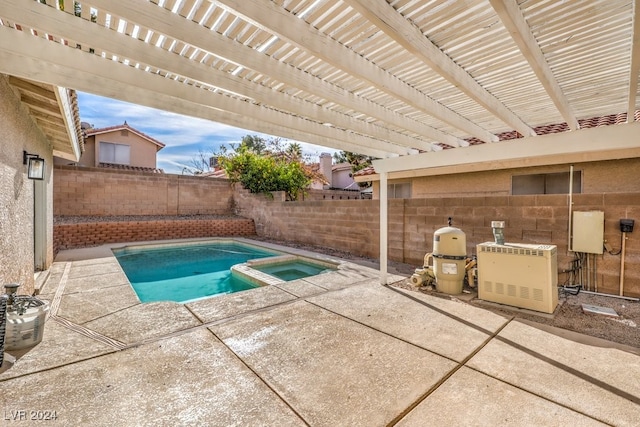 view of pool with a pergola, a patio area, and an in ground hot tub