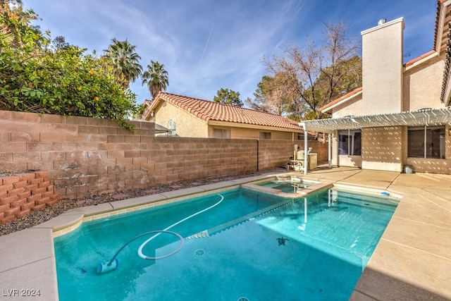 view of swimming pool with a pergola and a patio