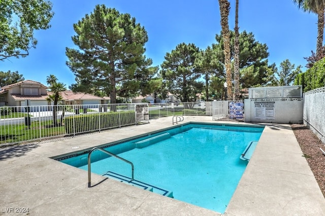 view of pool featuring a patio area