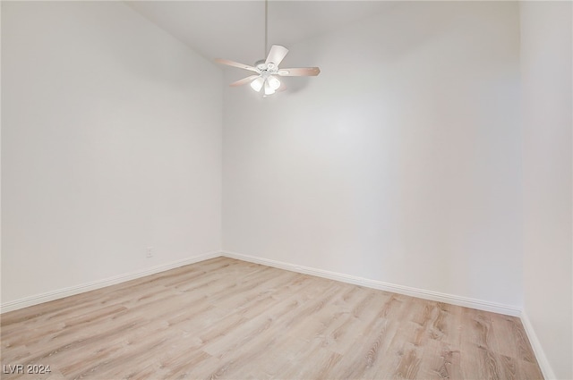 spare room with ceiling fan and light hardwood / wood-style floors