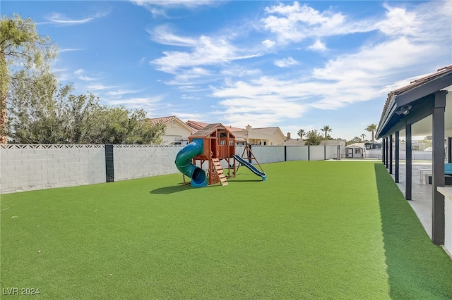 view of jungle gym with a yard