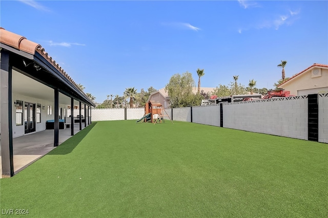 view of yard featuring a playground