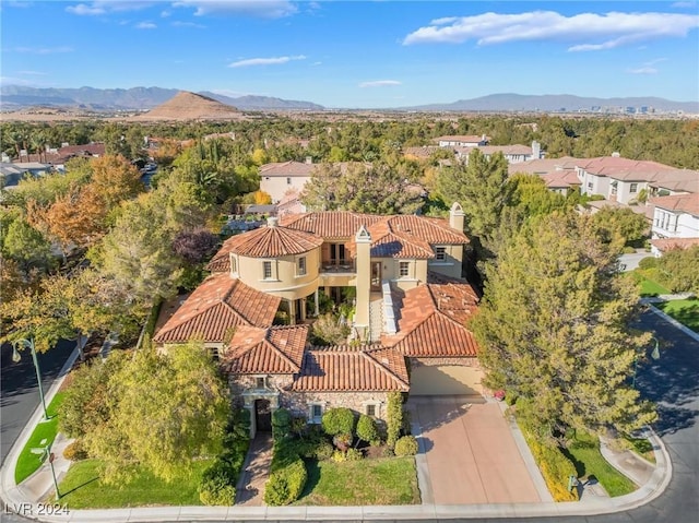 bird's eye view with a mountain view