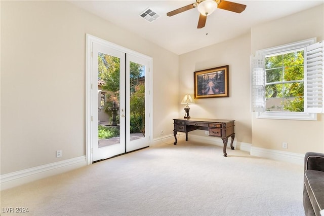 doorway featuring carpet floors and a healthy amount of sunlight