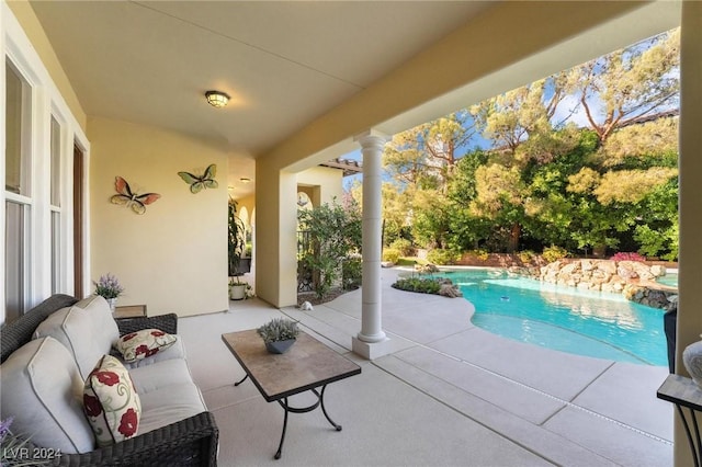 view of swimming pool featuring a patio area and outdoor lounge area