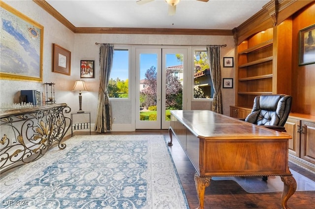 home office with built in shelves, ceiling fan, light hardwood / wood-style flooring, and crown molding