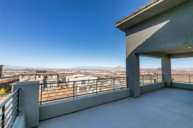 balcony featuring a mountain view