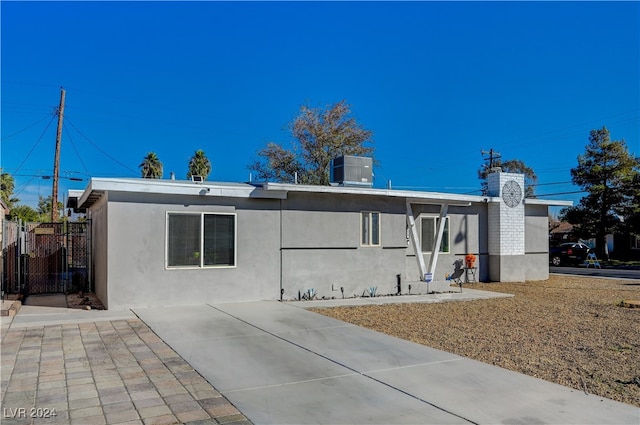 back of house featuring a patio and central AC