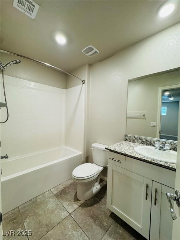 full bathroom with vanity, toilet, and  shower combination