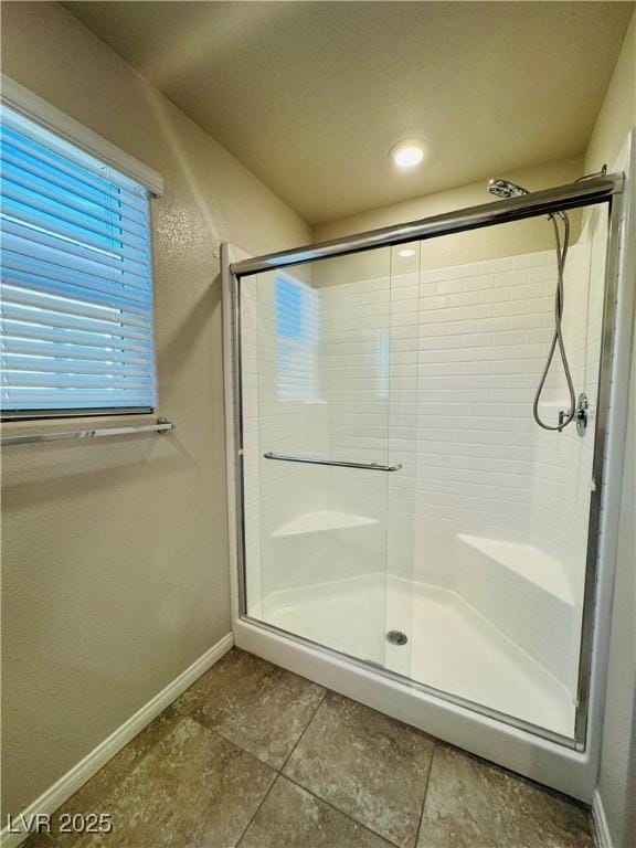 bathroom with walk in shower