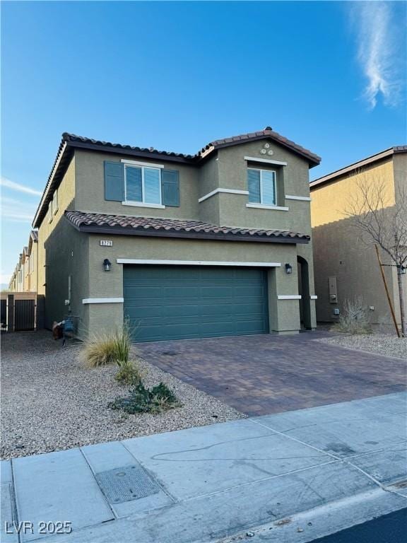 8279 Palladium St, Las Vegas, NV 89113 - mediterranean / spanish home with a garage