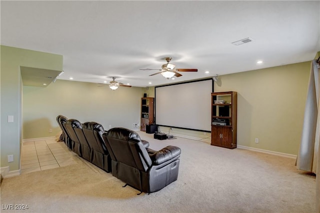 home theater room with light carpet and ceiling fan