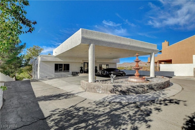 view of patio featuring a carport