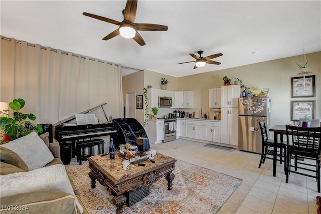 living room with ceiling fan and light tile patterned floors