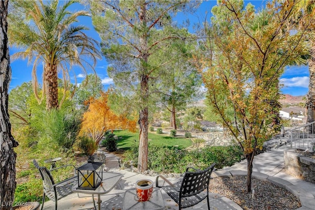 view of patio featuring an outdoor fire pit