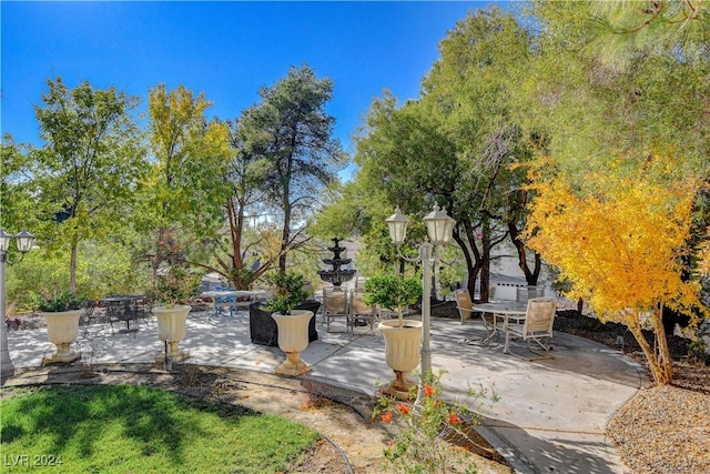 view of home's community with a patio