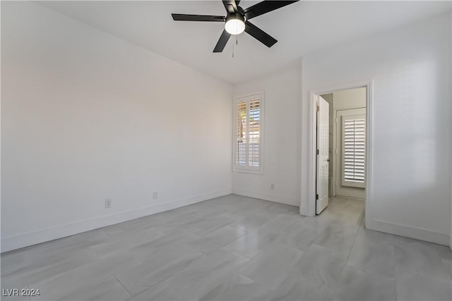 unfurnished bedroom featuring ceiling fan