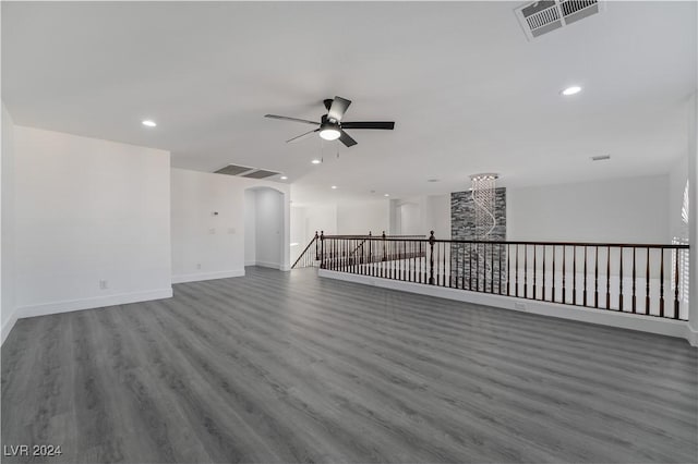 spare room featuring hardwood / wood-style floors and ceiling fan