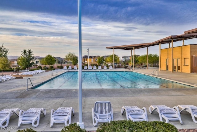 view of pool featuring a patio