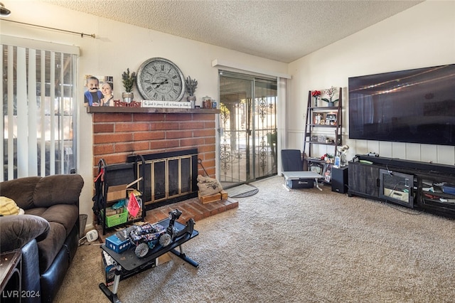 carpeted living room with a textured ceiling, a brick fireplace, and vaulted ceiling