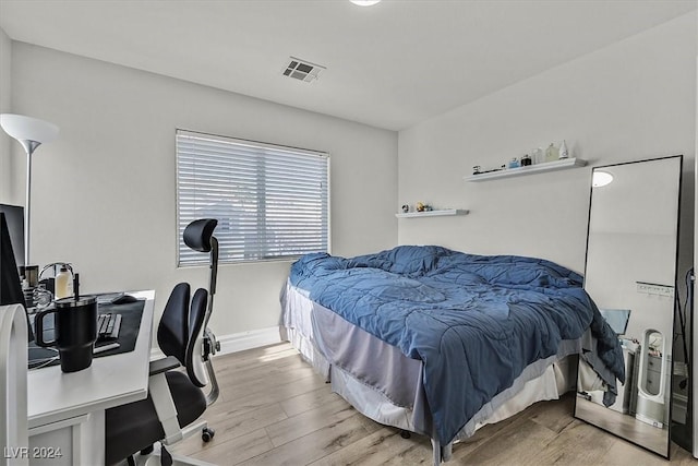 bedroom featuring light hardwood / wood-style flooring