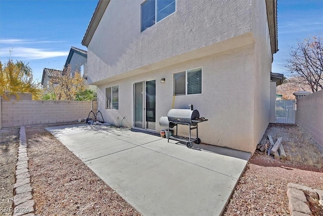 back of house featuring a patio