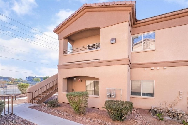 5751 E Hacienda Ave Unit 261, Las Vegas, NV 89122 - view of property with stairs