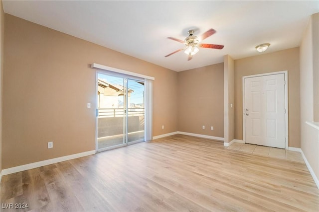 unfurnished room featuring ceiling fan and light wood-type flooring