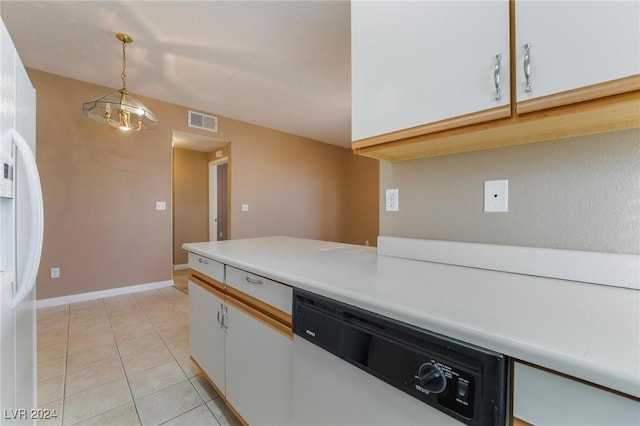 kitchen with white cabinetry, an inviting chandelier, pendant lighting, white appliances, and light tile patterned floors