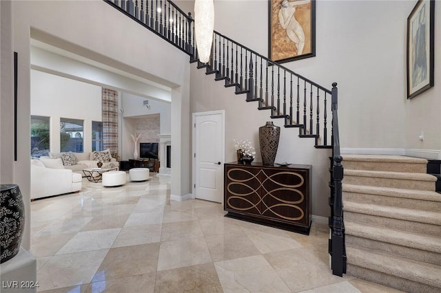 stairway with a towering ceiling