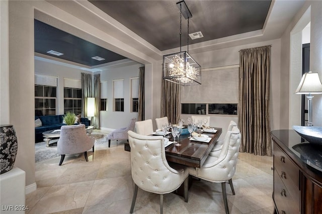 2781 Josephine Dr, Henderson, NV 89044 - dining area featuring a raised ceiling, a chandelier, and light tile patterned floors