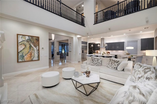 living room with a high ceiling