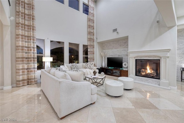 living room with a high ceiling