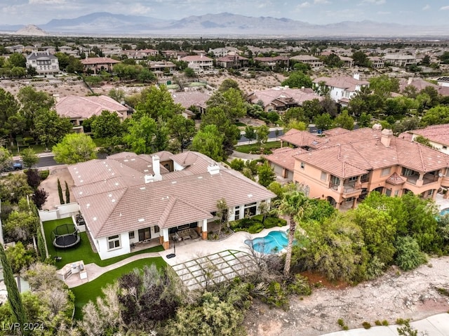 drone / aerial view featuring a mountain view